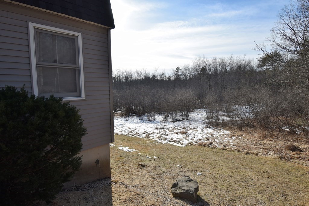 230 Chester Road Fremont, NH 03044 - Photo 27 of 30 a view of a backyard of the house