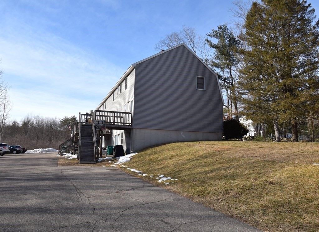 230 Chester Road Fremont, NH 03044 - Photo 3 of 30 a house with trees in the background