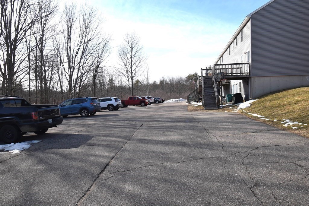 230 Chester Road Fremont, NH 03044 - Photo 4 of 30 a view of street with parked cars