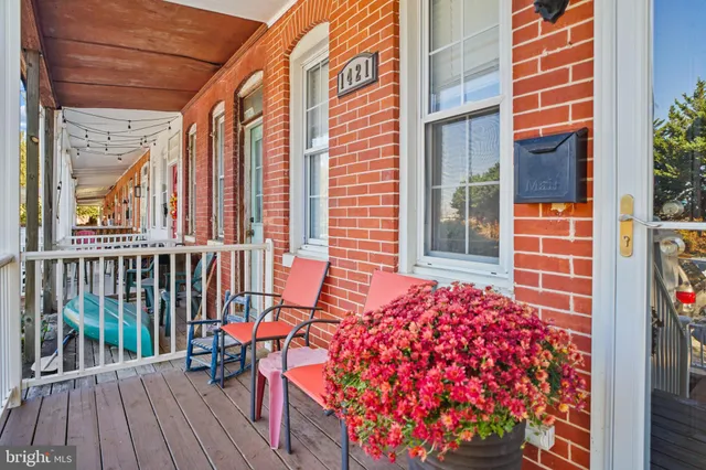 front view of a house with a balcony
