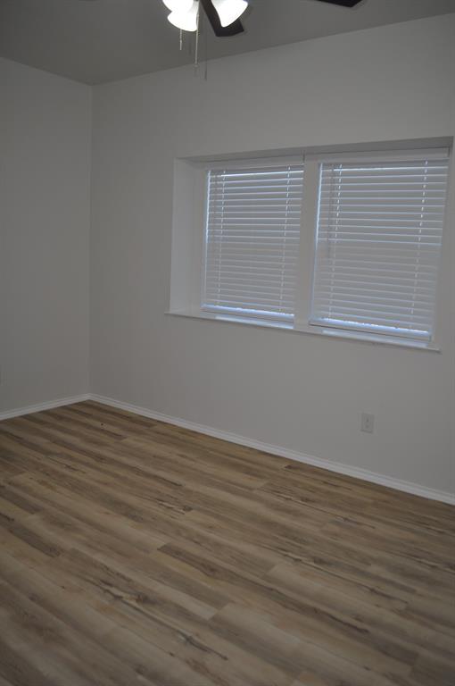 2321 Murphy Court Red Oak, TX 75154 - Photo 11 of 21 a view of empty room with wooden floor