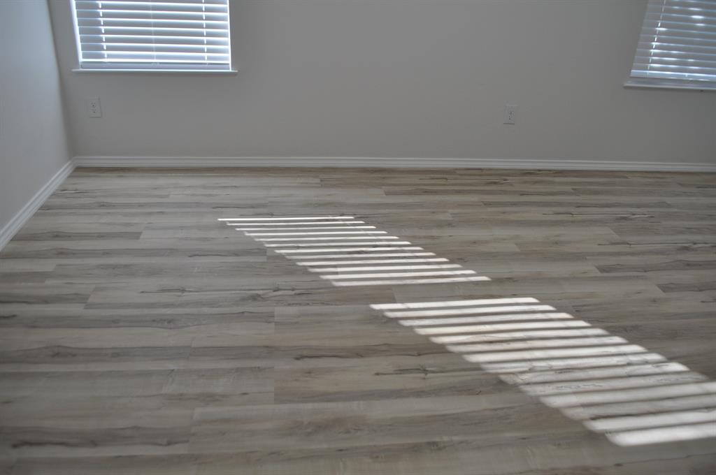 2321 Murphy Court Red Oak, TX 75154 - Photo 15 of 21 a view of empty room with wooden floor
