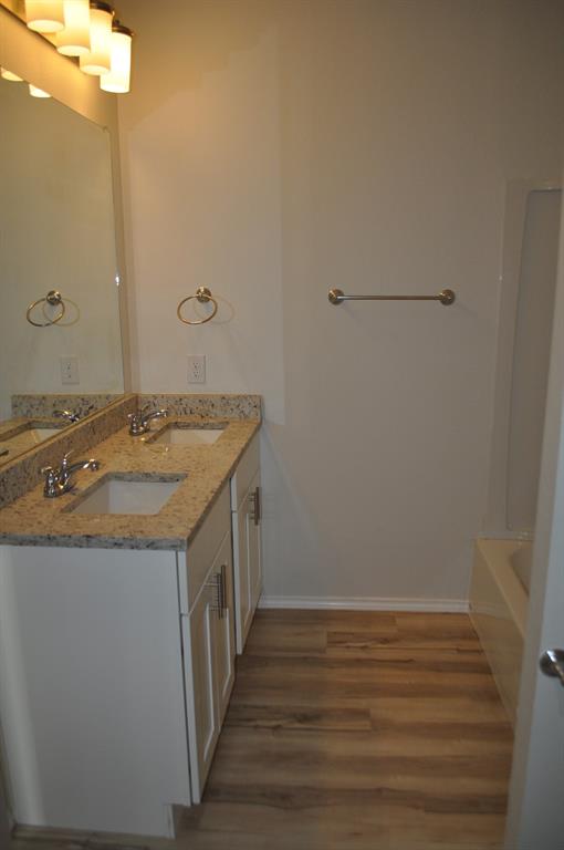 2321 Murphy Court Red Oak, TX 75154 - Photo 17 of 21 a bathroom with a sink and vanity