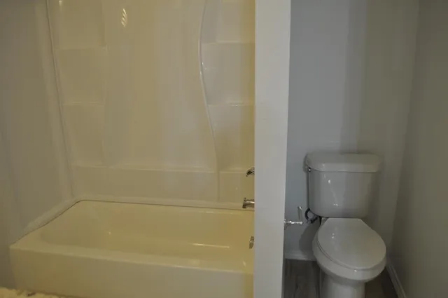 a bathroom with a sink and vanity