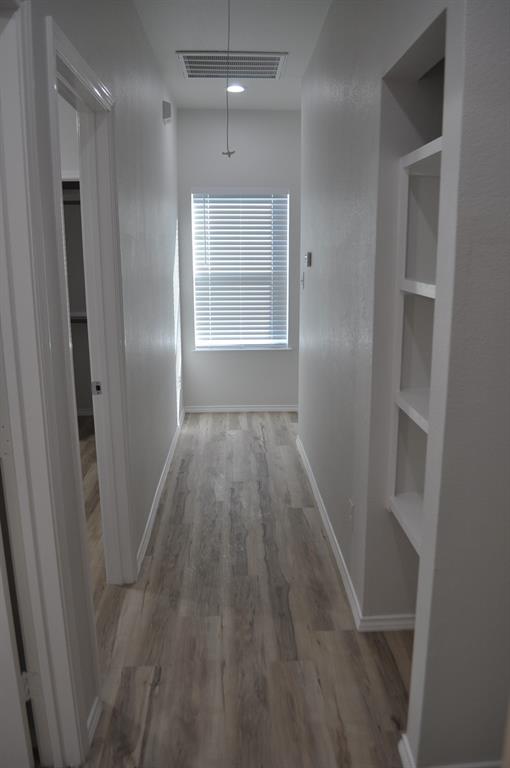 2321 Murphy Court Red Oak, TX 75154 - Photo 19 of 21 a view of hallway with wooden floor