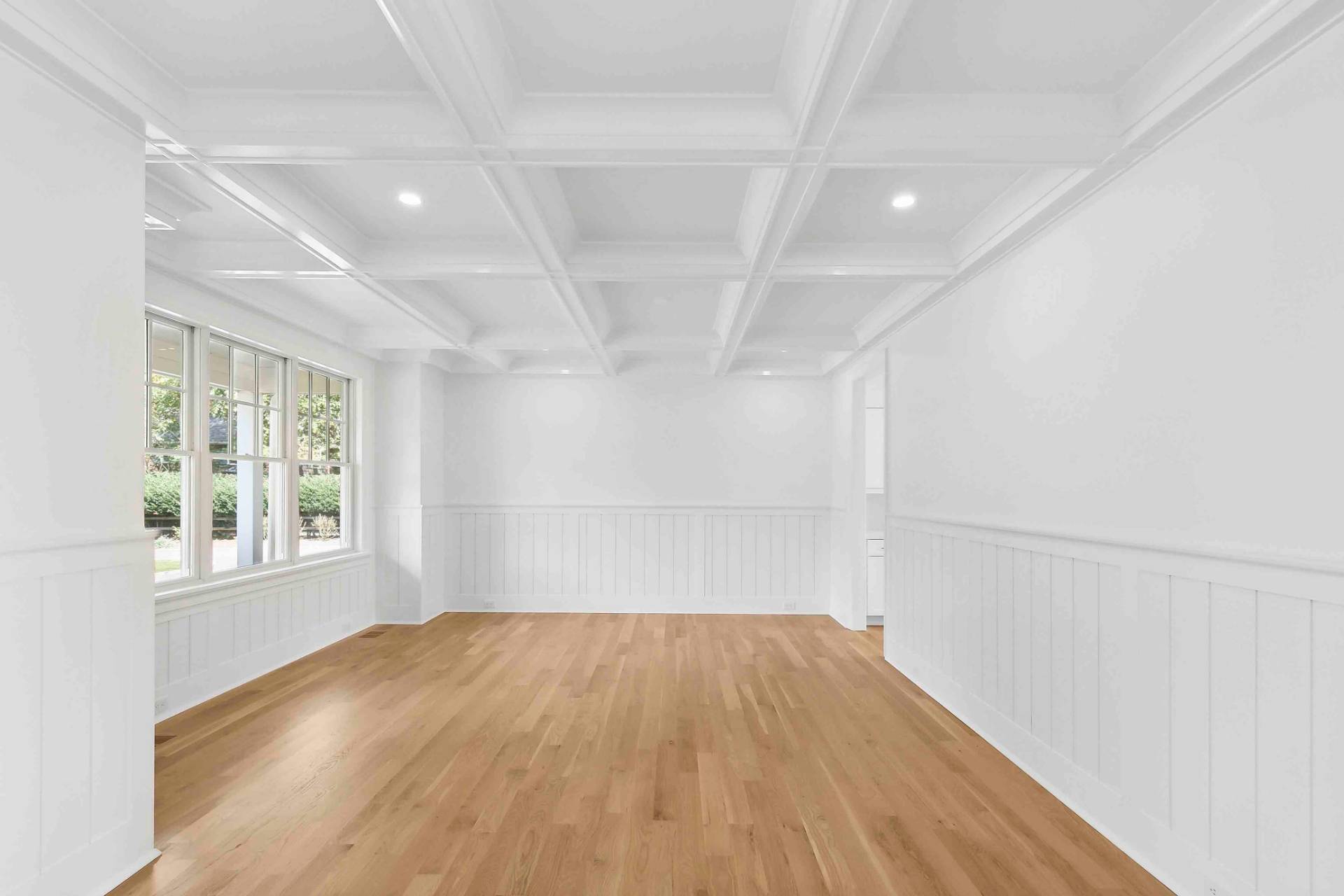 10 Cedar Lane Westhampton, NY 11977 - Photo 2 of 29 an empty room with wooden floor and windows