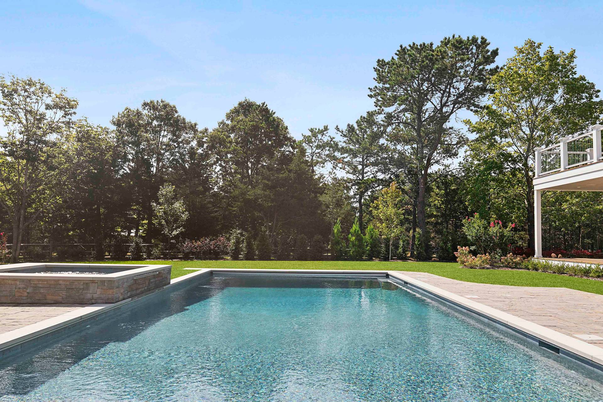 10 Cedar Lane Westhampton, NY 11977 - Photo 22 of 29 a view of a swimming pool with an outdoor seating