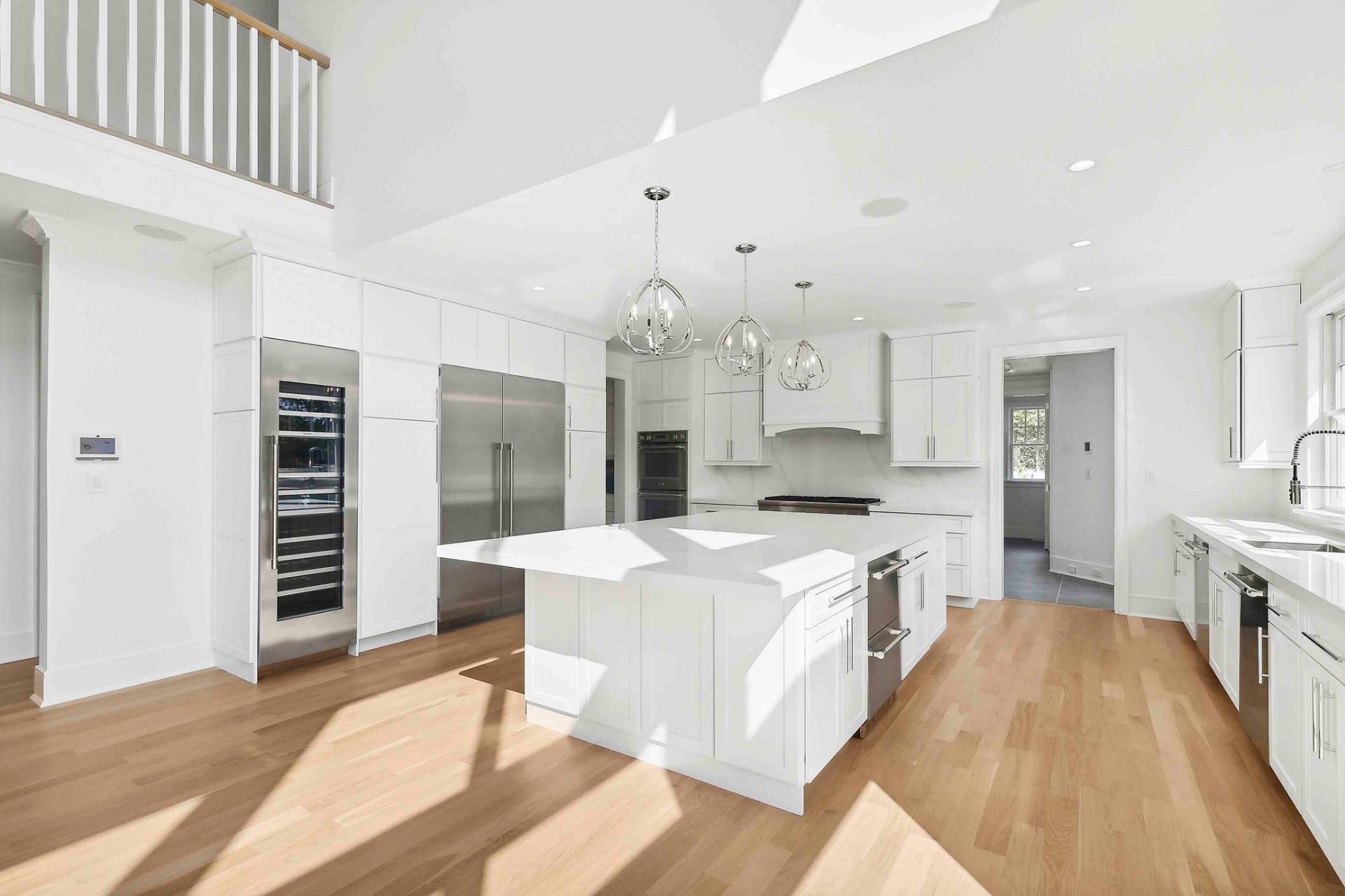 10 Cedar Lane Westhampton, NY 11977 - Photo 6 of 29 a large kitchen with kitchen island a sink and a stove
