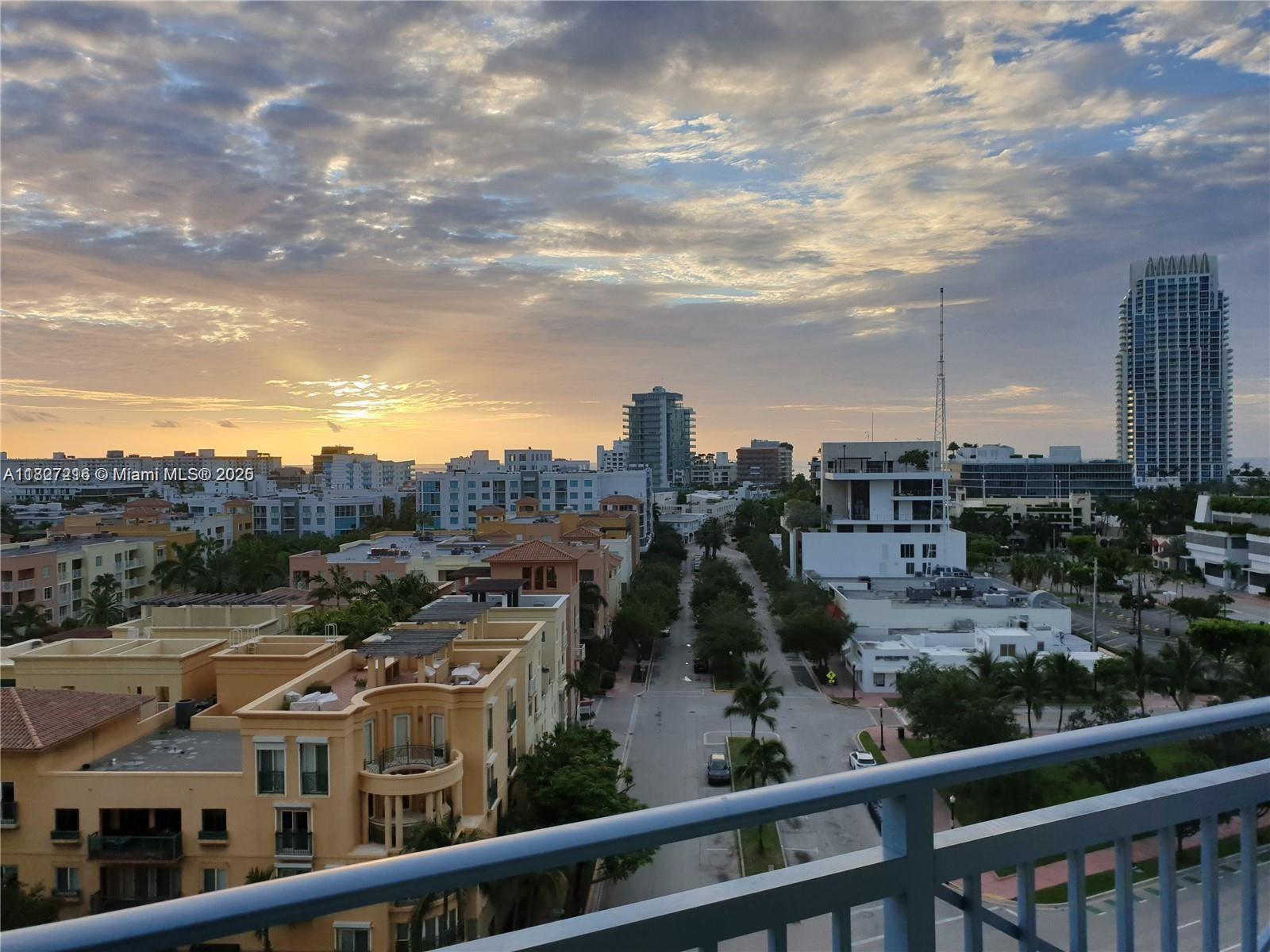 90 Alton Road, Unit 1005 Miami Beach, FL 33139 - Photo 5 of 22 a view of a city from a balcony