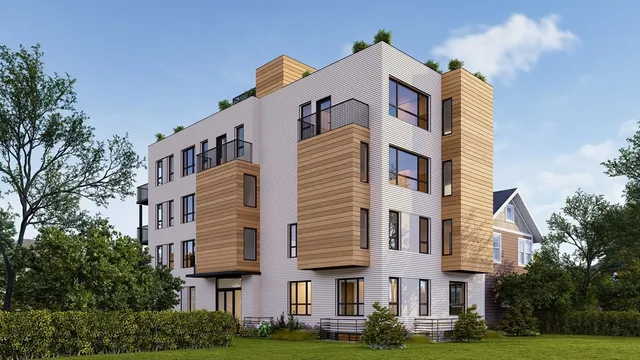 a view of a building with a yard