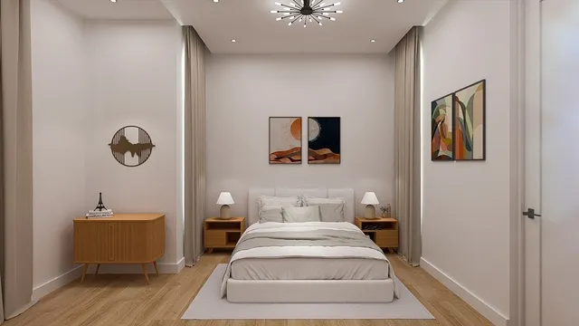 a spacious bedroom with a bed and a chandelier