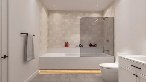 a bathroom with a bathtub and a toilet