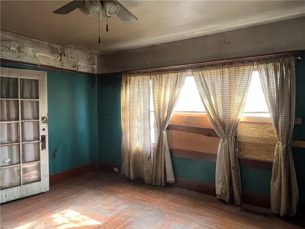 an empty room with windows