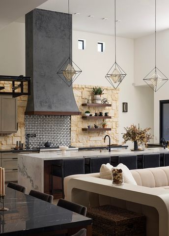a kitchen with a stove and cabinets