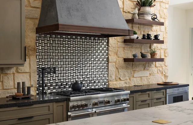 a bathroom with a sink a mirror and shower