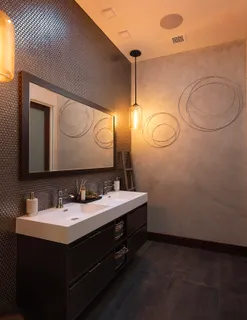 a bedroom with a bed and a television