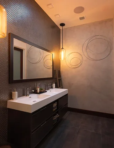 a bedroom with a bed and a television