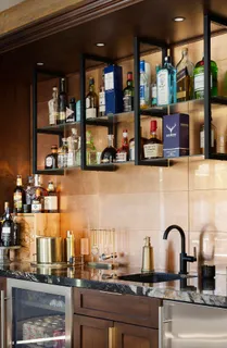 a room with painting and a table