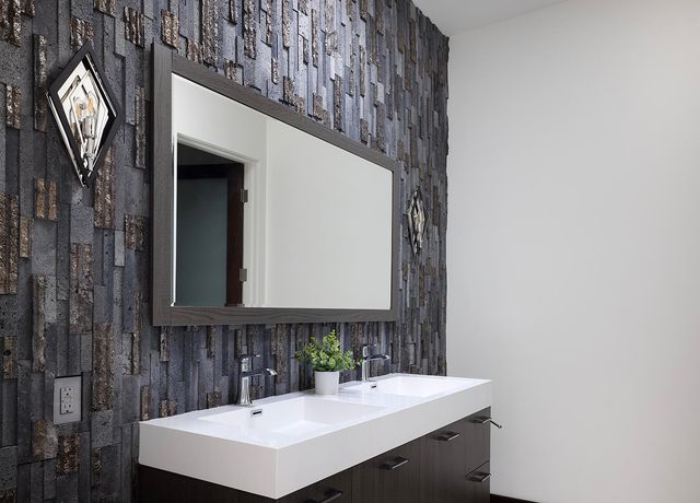 a view of a backyard with a patio and outdoor seating