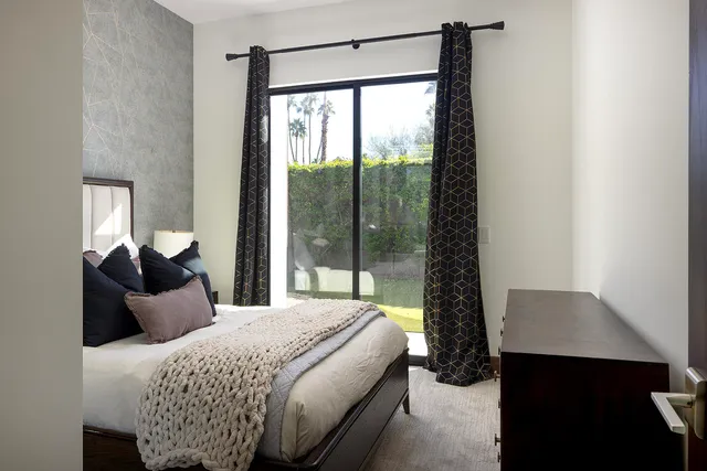 a view of a swimming pool and sitting space