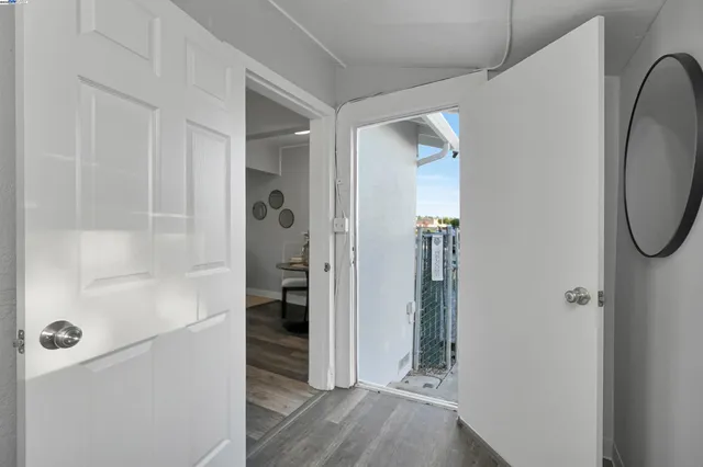 a view of a bathroom from a hallway