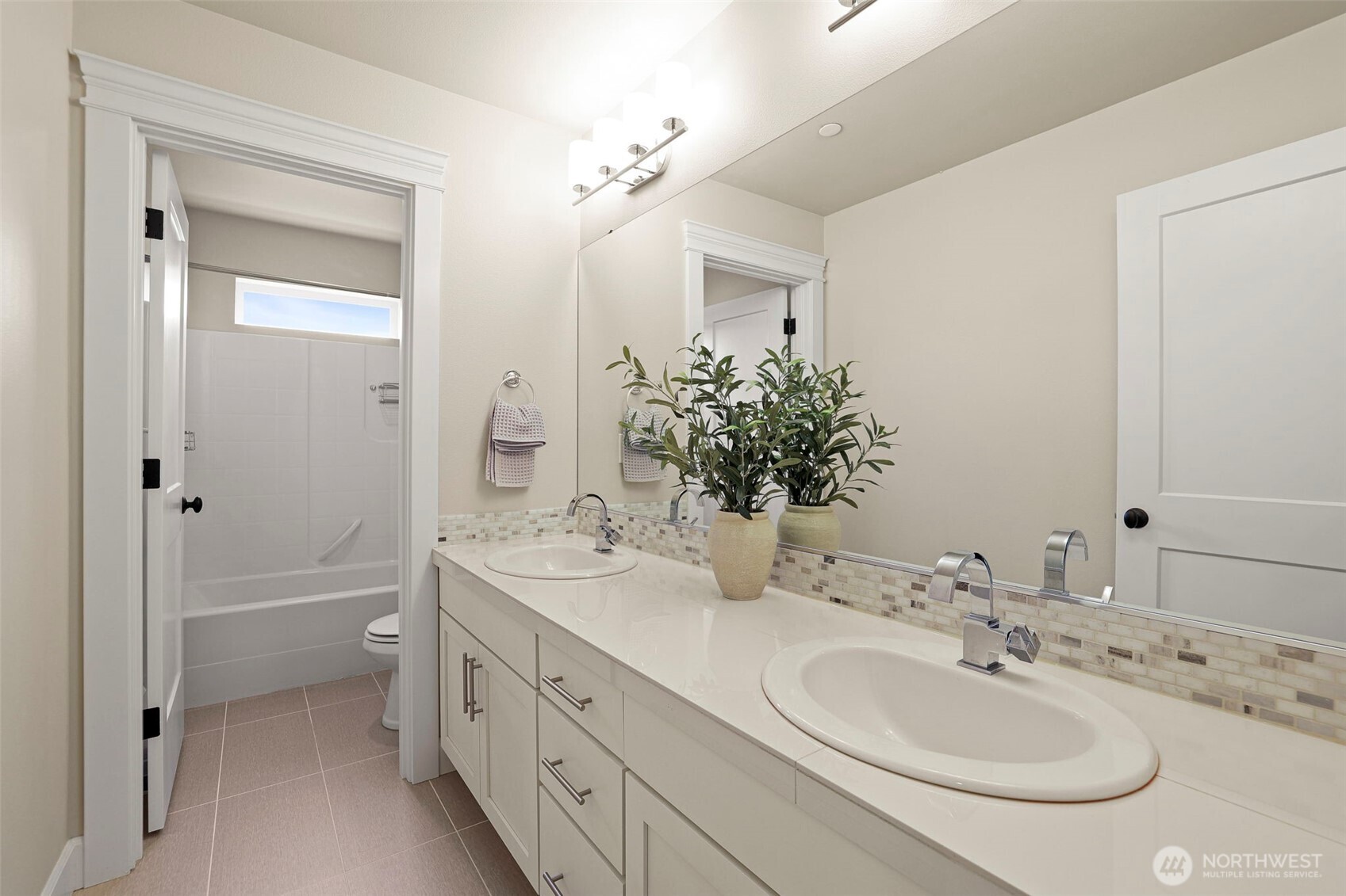 29 242nd Street Southeast Bothell, WA 98021 - Photo 24 of 40 a bathroom with a double vanity sink mirror and shower