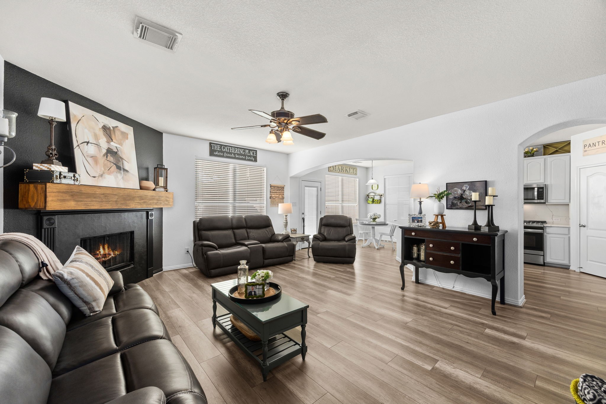 6911 Hamilton Falls Lane Spring, TX 77379 - Photo 11 of 42 a living room with furniture fireplace and window