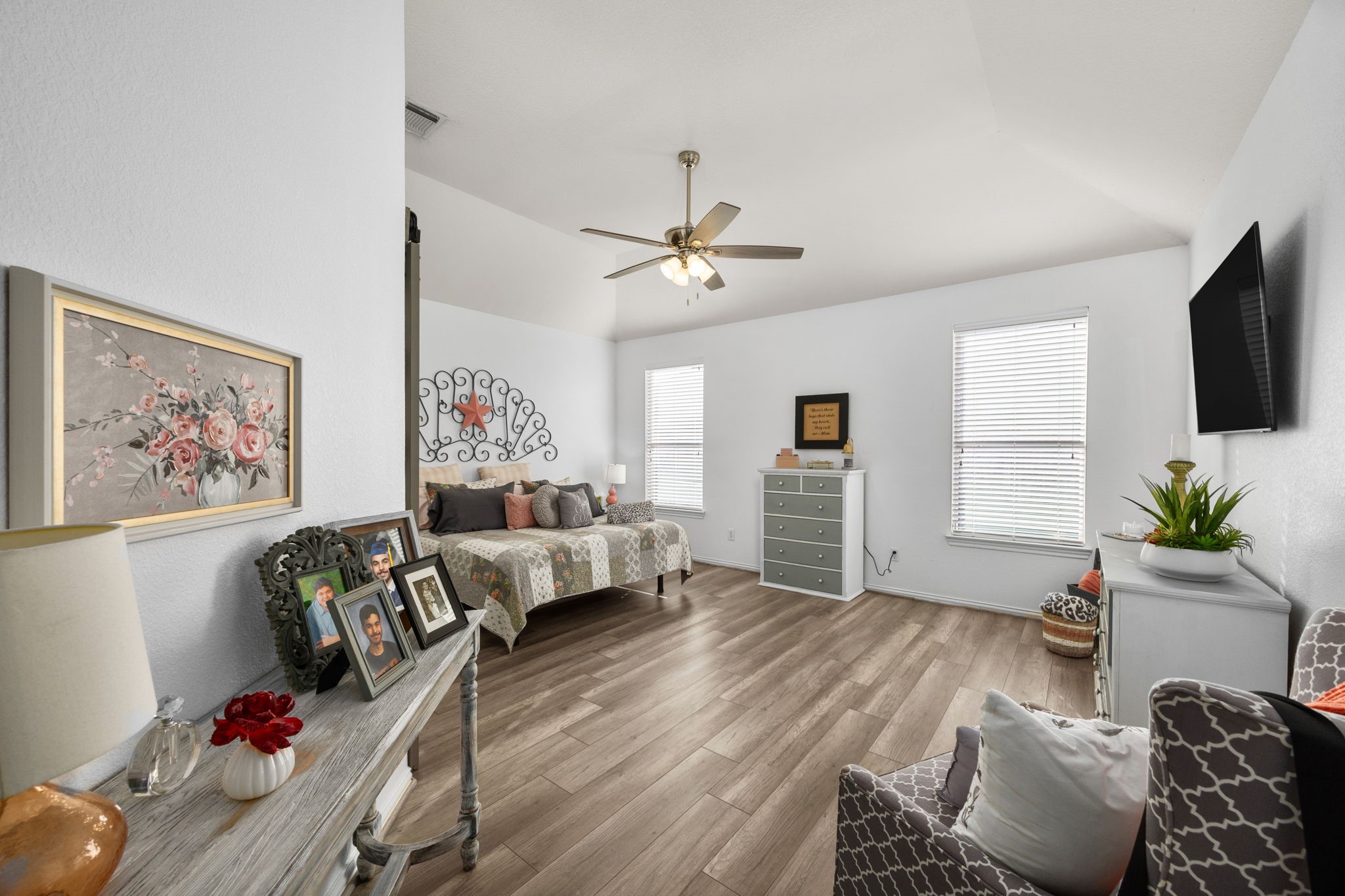 6911 Hamilton Falls Lane Spring, TX 77379 - Photo 18 of 42 a living room with furniture ceiling fan and a window