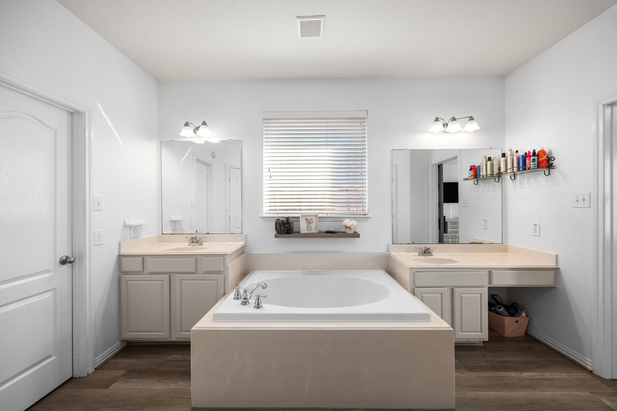 6911 Hamilton Falls Lane Spring, TX 77379 - Photo 25 of 42 a bathroom with a sink a toilet and a mirror