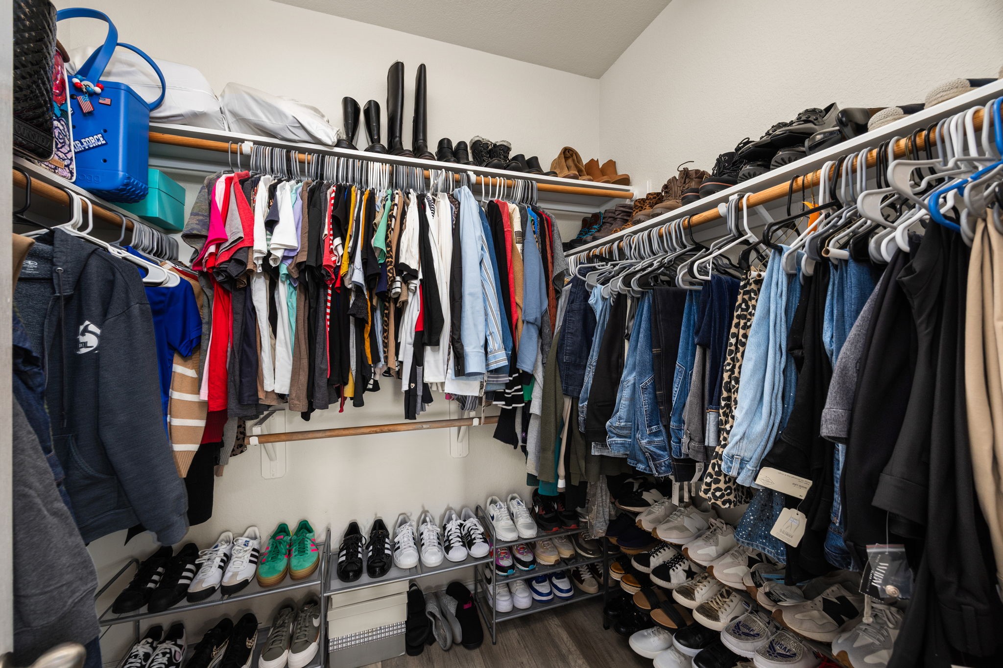 6911 Hamilton Falls Lane Spring, TX 77379 - Photo 26 of 42 a view of walk in closet with clothes