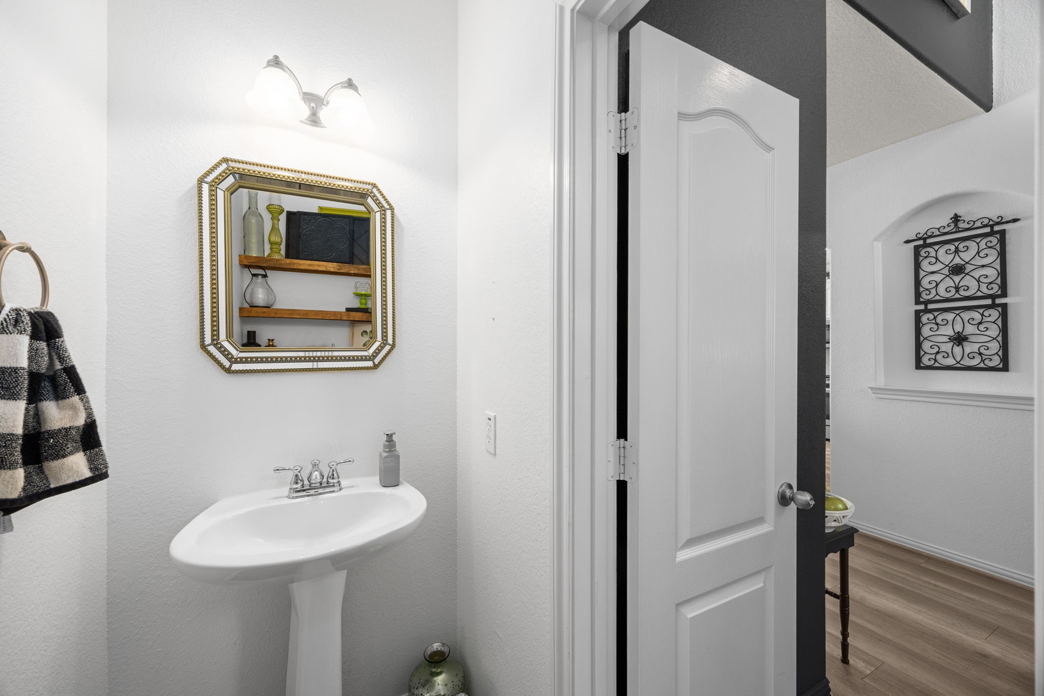 6911 Hamilton Falls Lane Spring, TX 77379 - Photo 27 of 42 a bathroom with a sink and a mirror