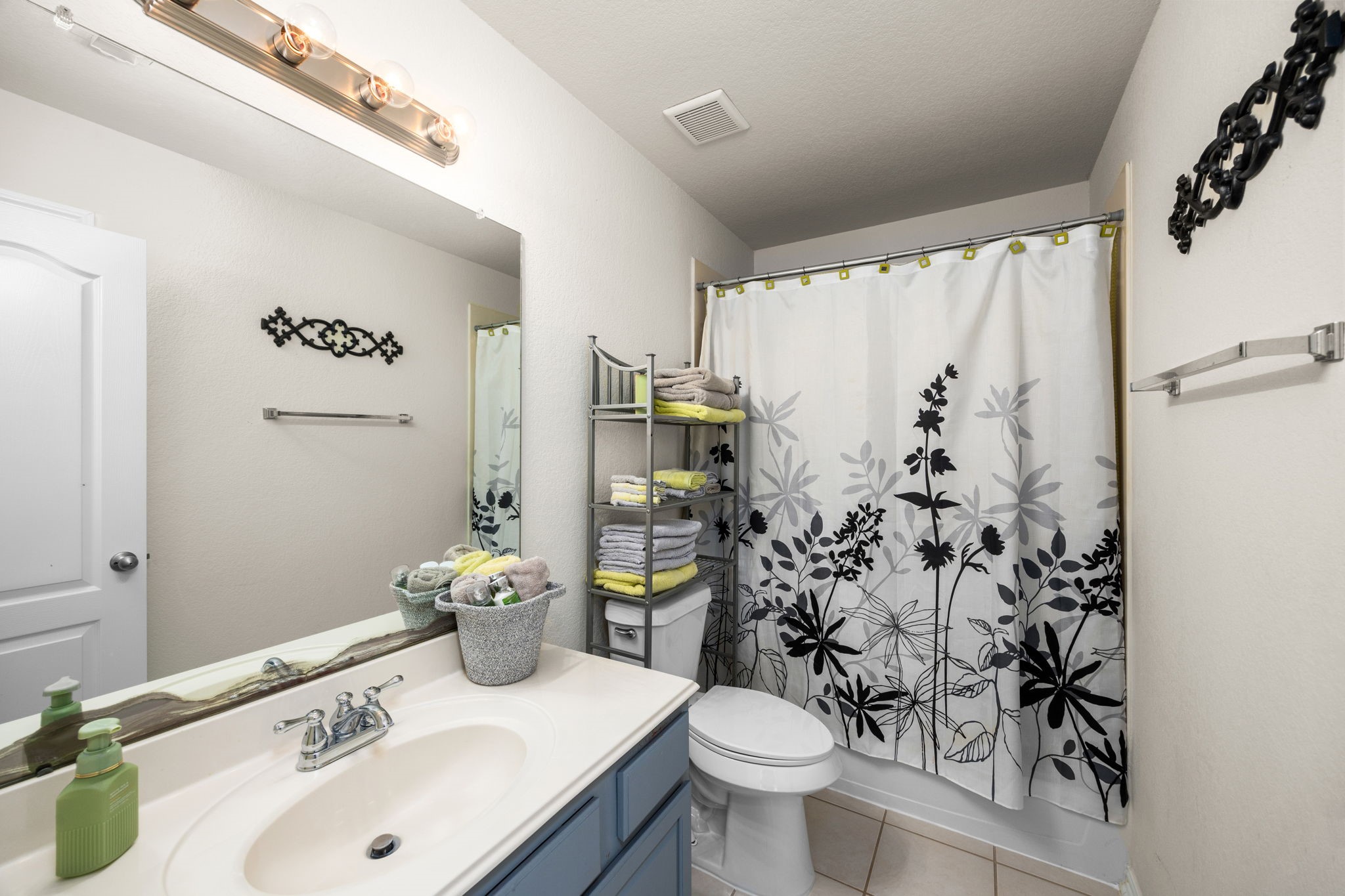 6911 Hamilton Falls Lane Spring, TX 77379 - Photo 31 of 42 a bathroom with a sink toilet and shower