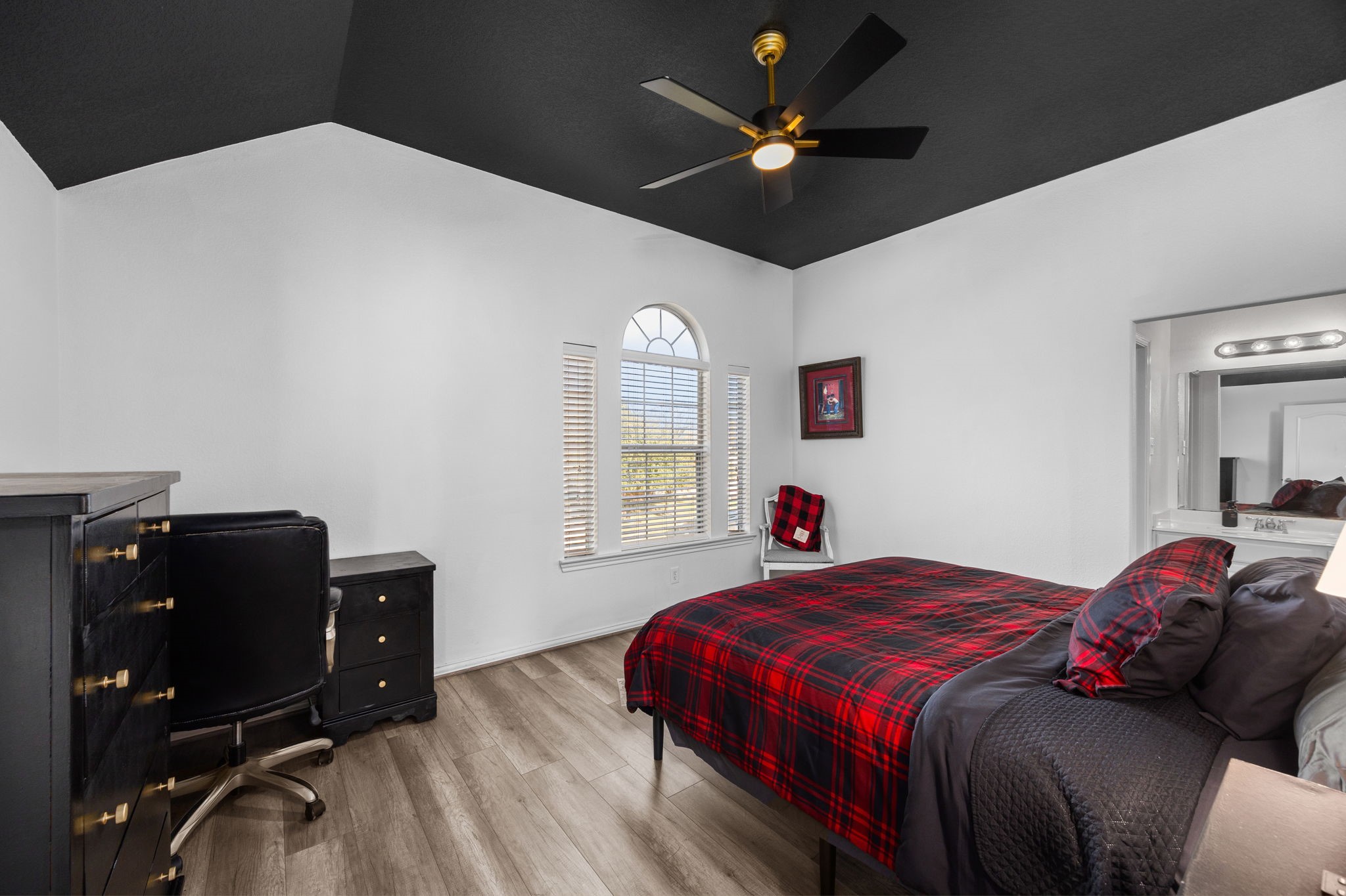 6911 Hamilton Falls Lane Spring, TX 77379 - Photo 33 of 42 a bedroom with a bed dresser and a window