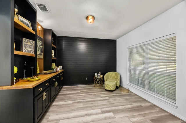 a bedroom with a bed and a closet