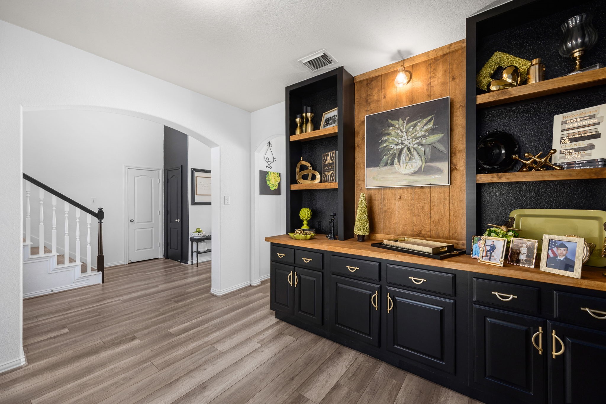 6911 Hamilton Falls Lane Spring, TX 77379 - Photo 9 of 42 a room with wooden cabinets and a wooden floor