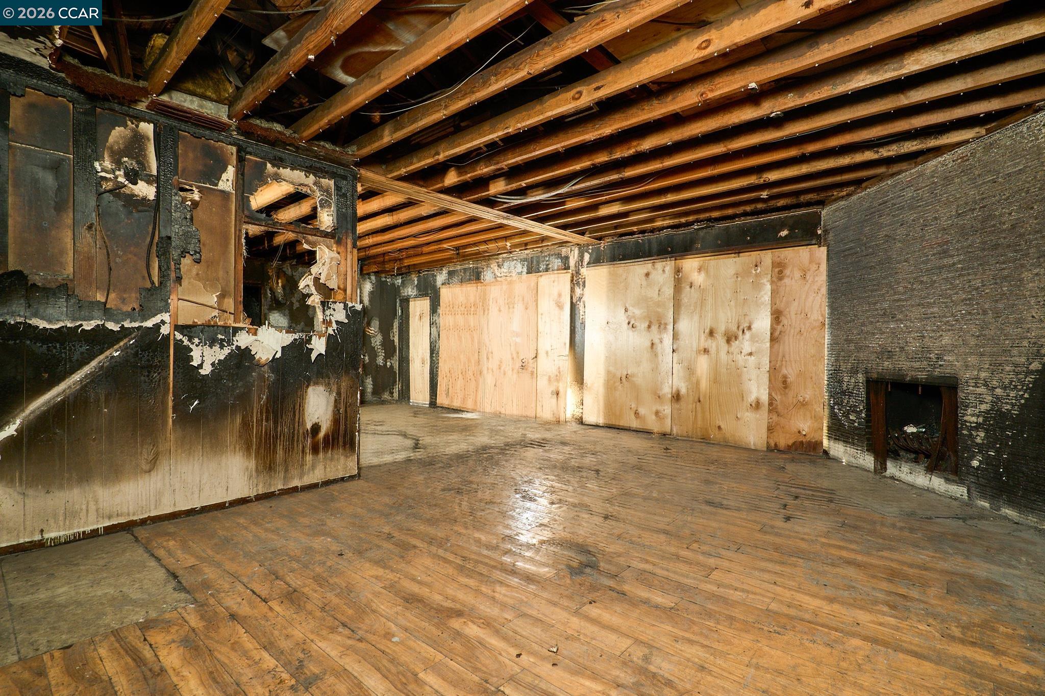 3530 William Way Sacramento, CA 95821 - Photo 22 of 27 a view of an empty room with a fireplace and painted walls