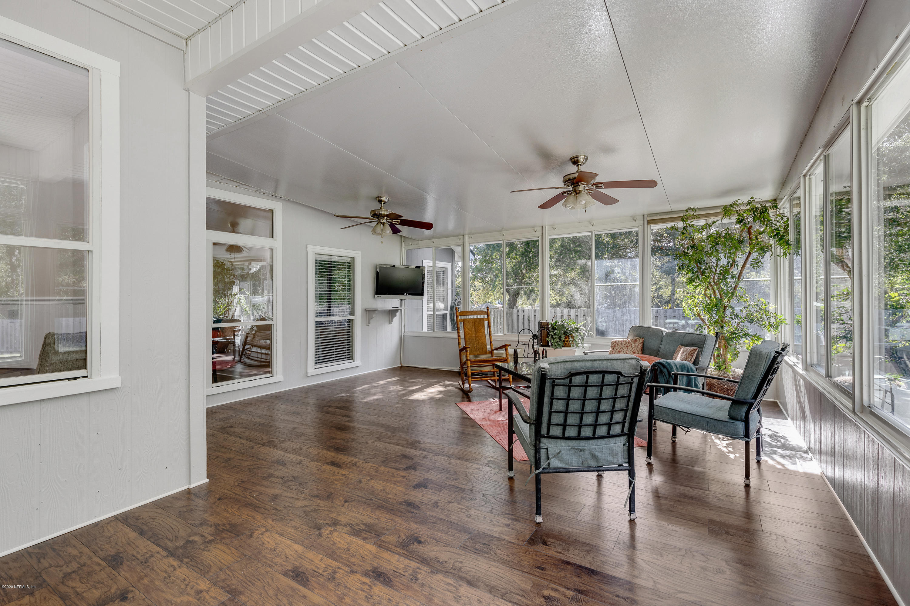 1798 Covington Lane Fleming Island, FL 32003 - Photo 17 of 30 a dining room with furniture window and wooden floor