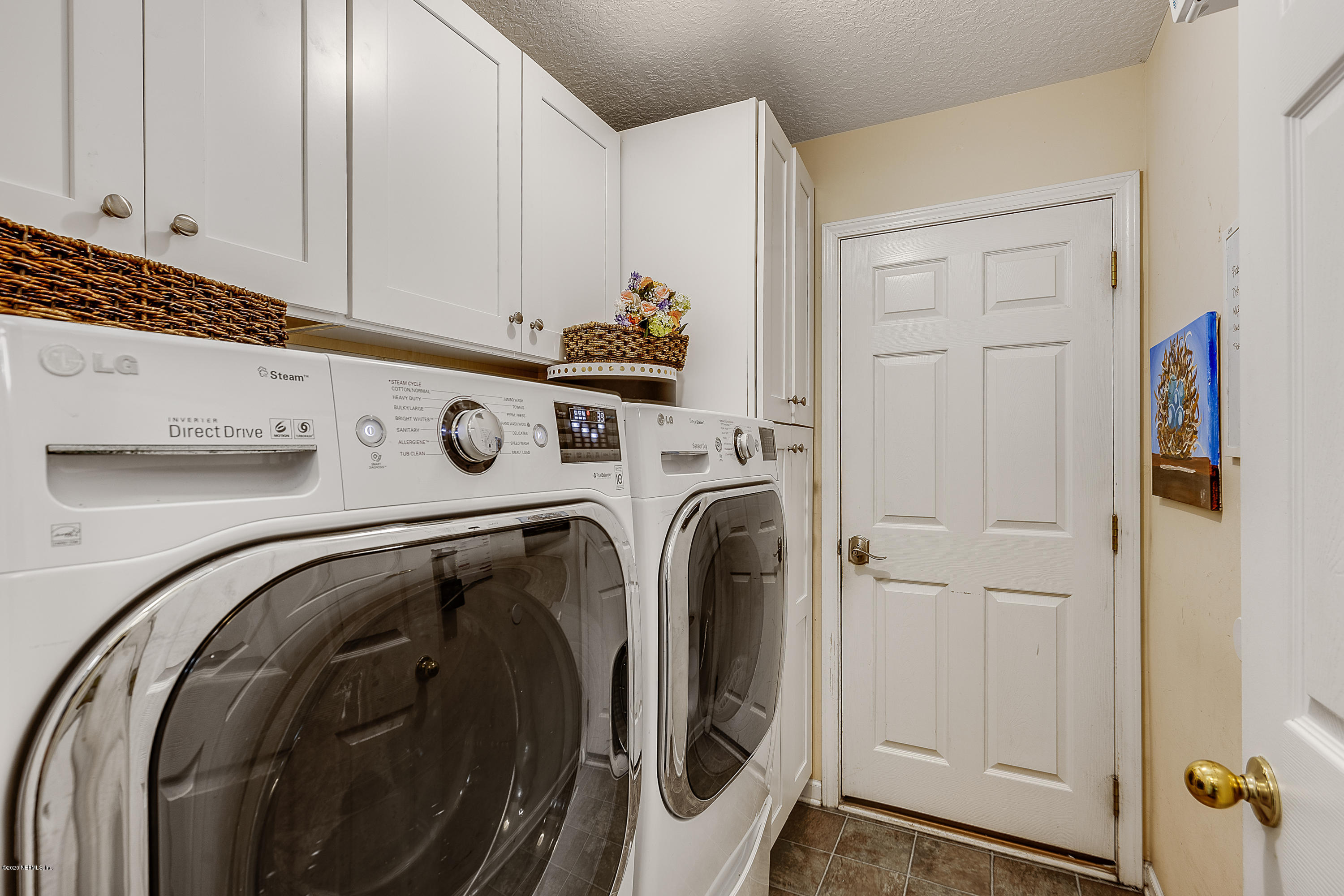 1798 Covington Lane Fleming Island, FL 32003 - Photo 22 of 30 a utility room with dryer and washer