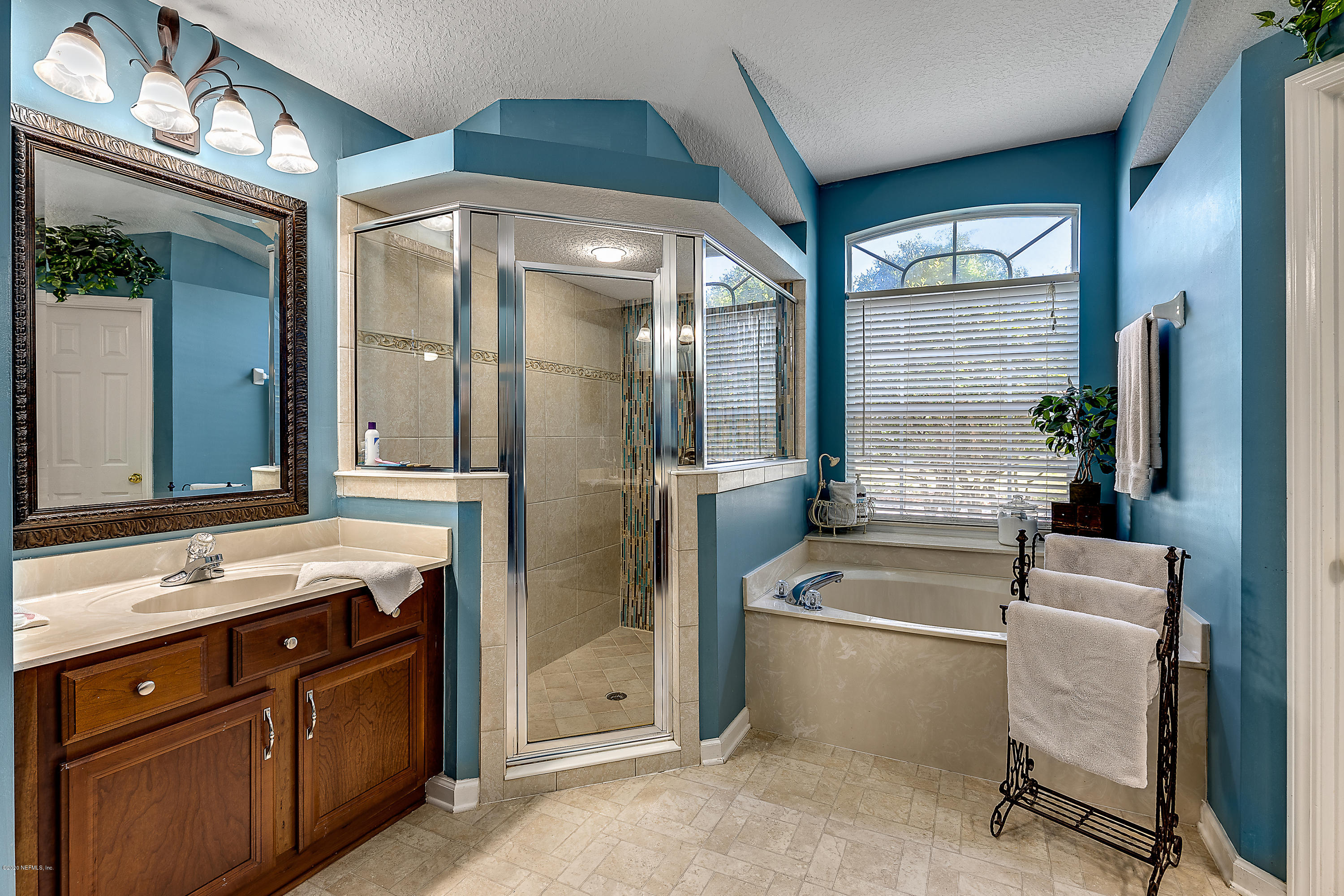 1798 Covington Lane Fleming Island, FL 32003 - Photo 26 of 30 a bathroom with a sink a toilet and shower