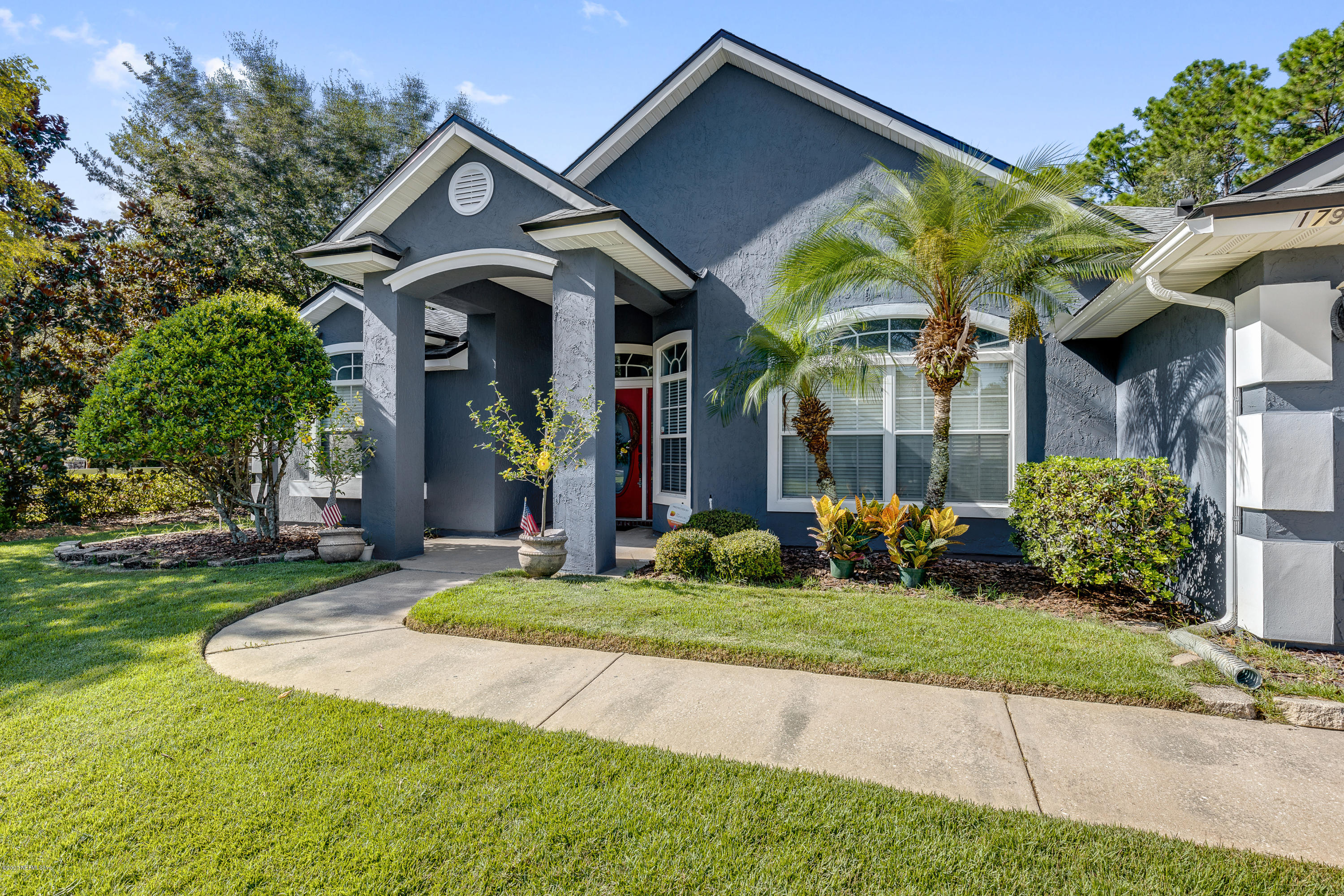 1798 Covington Lane Fleming Island, FL 32003 - Photo 3 of 30 a front view of a house with garden