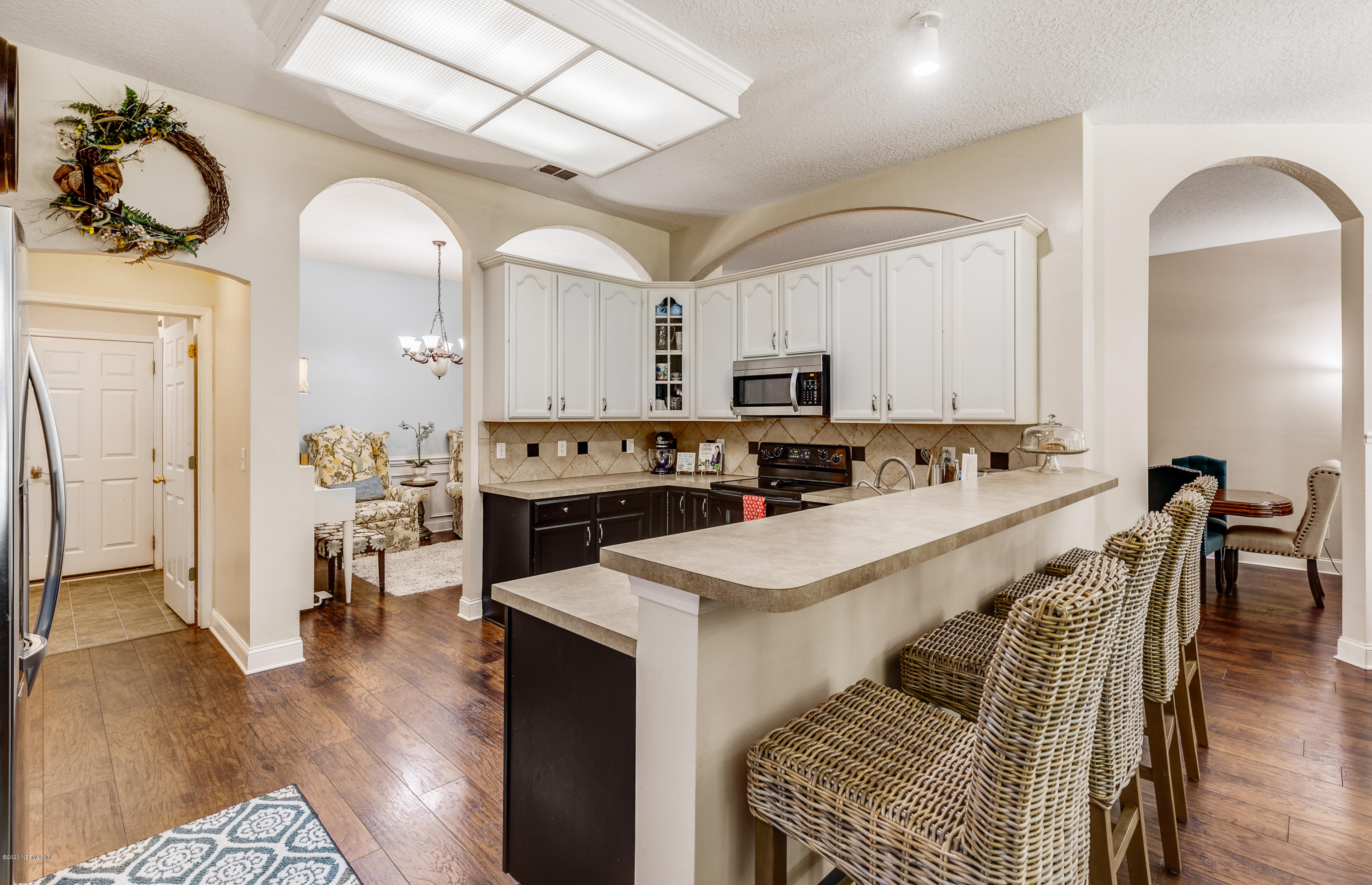 1798 Covington Lane Fleming Island, FL 32003 - Photo 10 of 30 a view of kitchen with sink and refrigerator