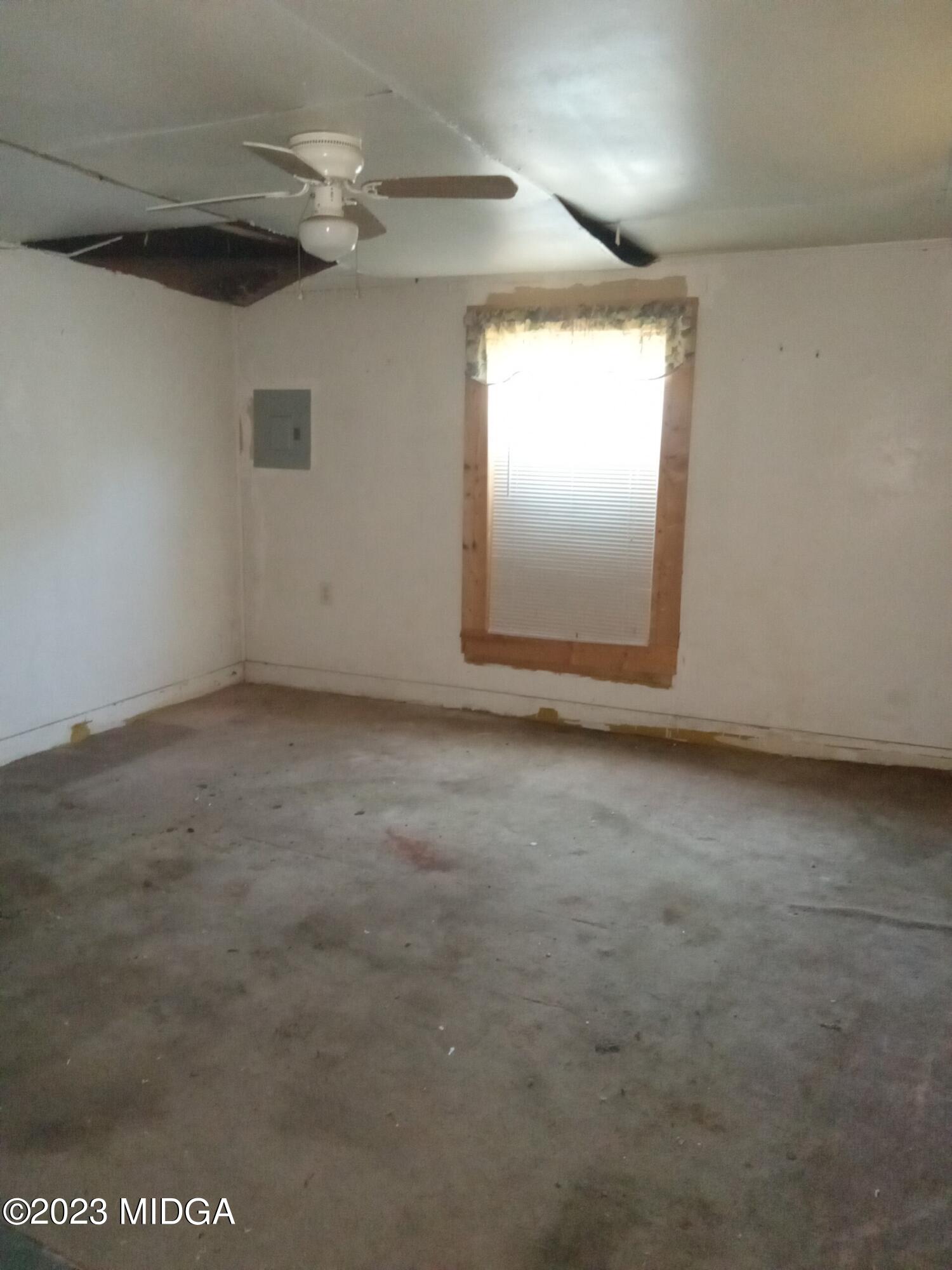 1123 Smith Street Macon, GA 31217 - Photo 11 of 17 an empty room with windows and closet
