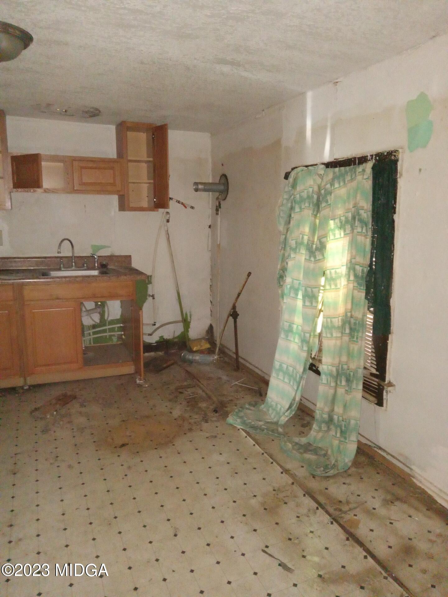 1123 Smith Street Macon, GA 31217 - Photo 5 of 17 a view of a room with window