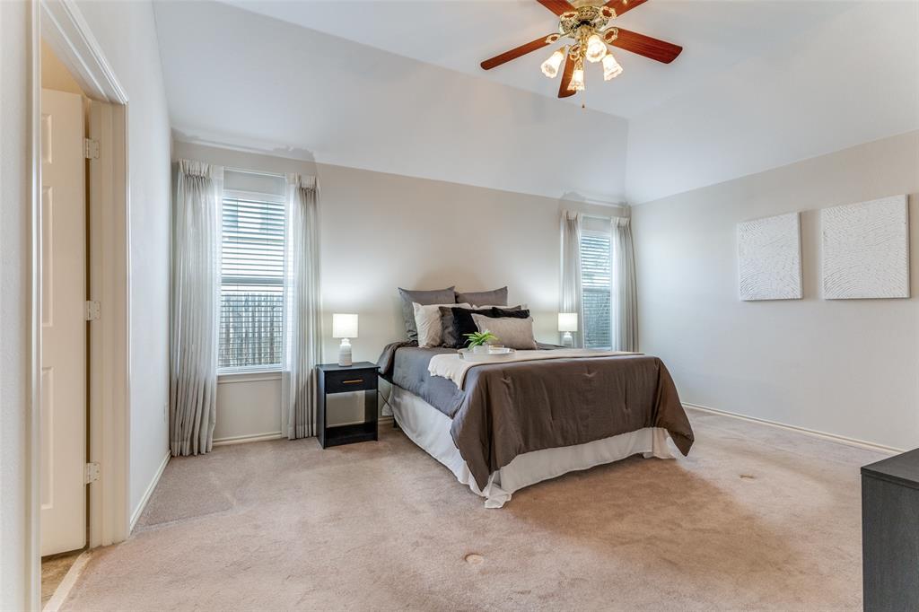 5213 Westheimer Road Fort Worth, TX 76244 - Photo 11 of 25 a bedroom with a bed and window
