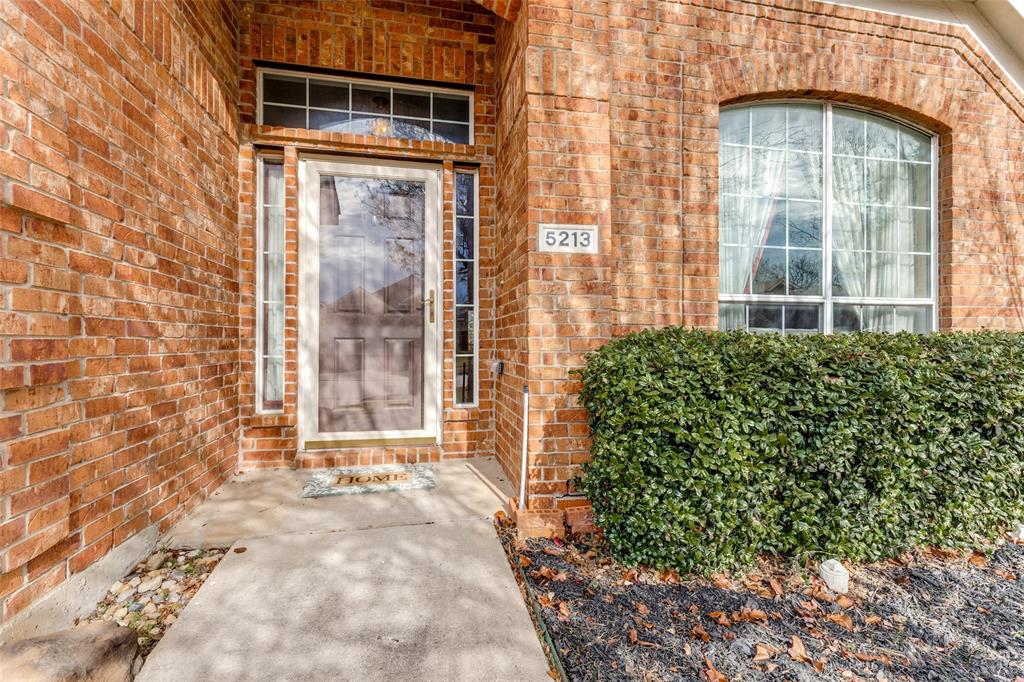 5213 Westheimer Road Fort Worth, TX 76244 - Photo 3 of 25 a front view of a house with a yard