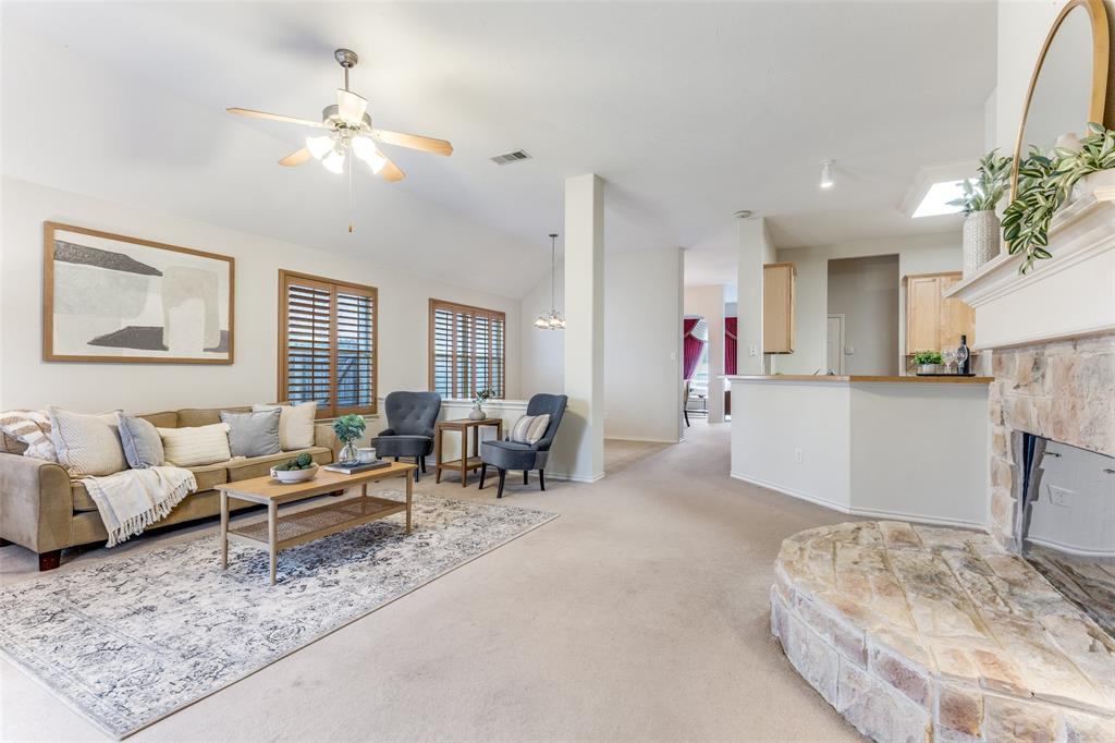 5213 Westheimer Road Fort Worth, TX 76244 - Photo 7 of 25 a living room with furniture and white walls