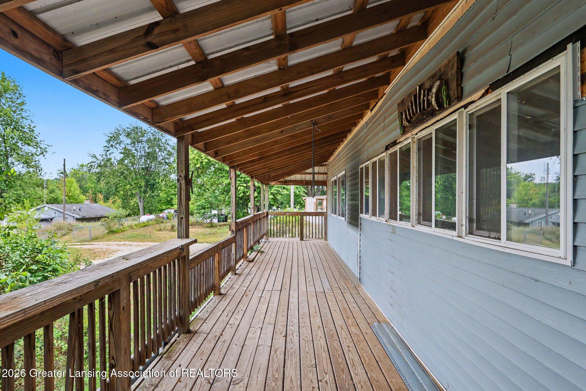 11837 Beech Road Brooklyn, MI 49230 - Photo 22 of 42 Wrap Around Porch Facing Lake