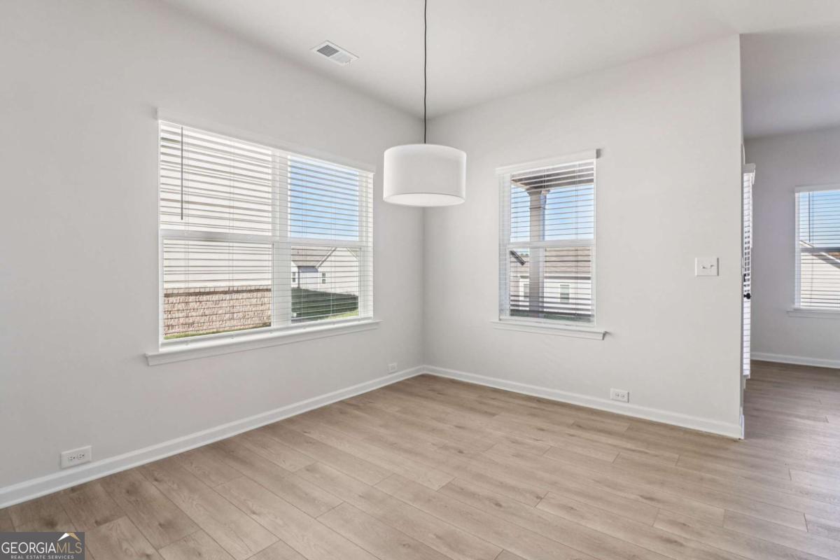 708 Shetland Trail Cartersville, GA 30121 - Photo 19 of 54 a view of an empty room with a window