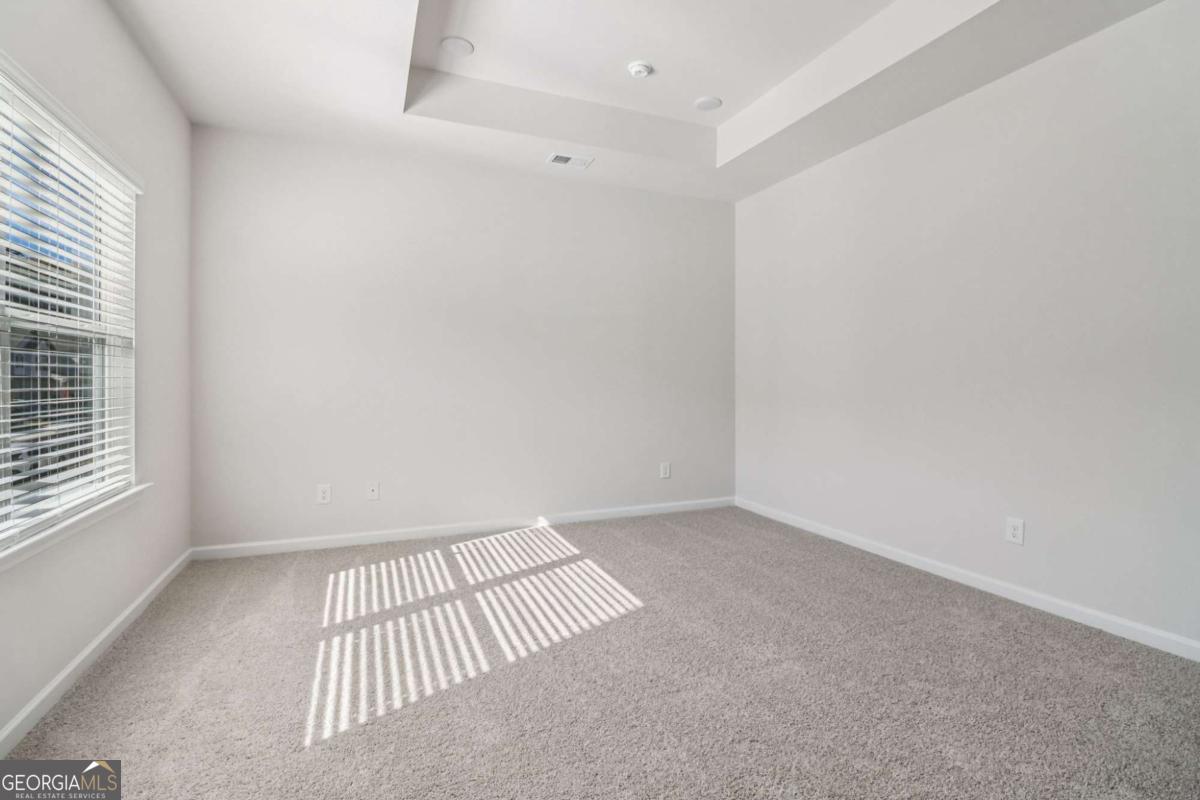 708 Shetland Trail Cartersville, GA 30121 - Photo 34 of 54 an empty room with a window