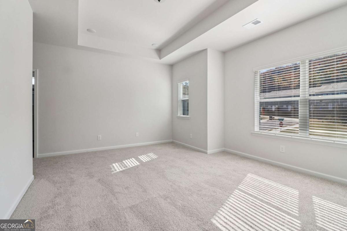 708 Shetland Trail Cartersville, GA 30121 - Photo 38 of 56 a view of an empty room with a window